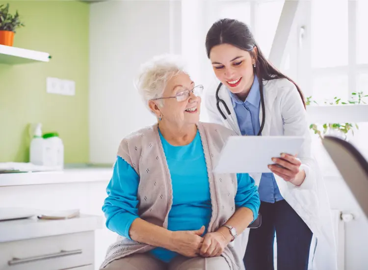 A  doctor consults with a patient