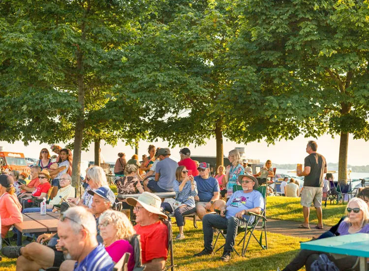 A crowd of people at a local park event