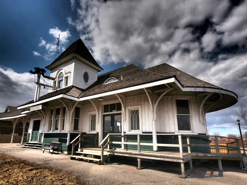 A large old fashioned train station. 